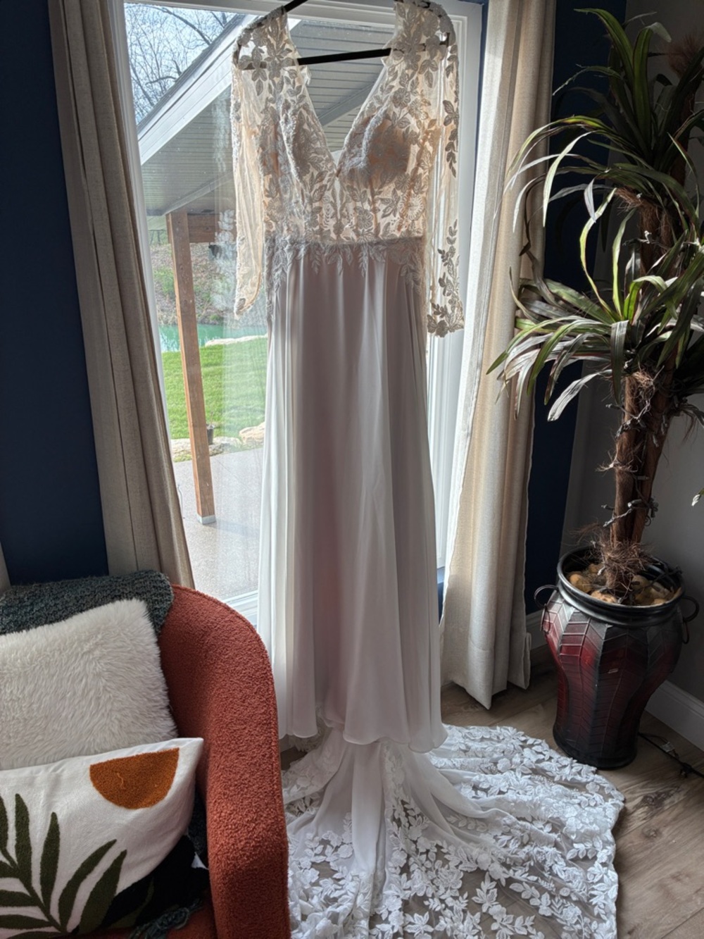 4. Elegant Long-Sleeve Lace Back Bridal Gown in Ivory - Picture 4 of 6
